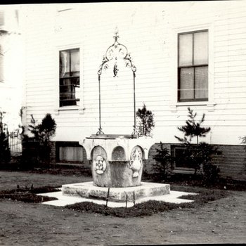 Outside Back Corner photo, with Lesley Wishing Well