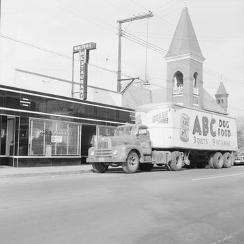 Walter's Restaurant, outside view, with an ABC Dog Food truck driving in front. 2