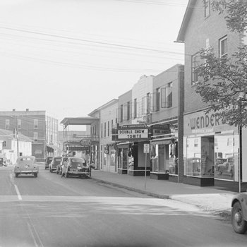 Alternate view of the movie theater, with the street included in the photograph.