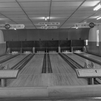 Inside of a bowling alley.