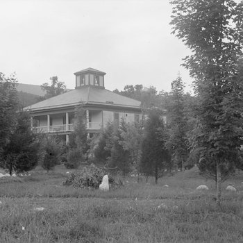 Shenandoah Alum Springs Hotel, view of one of the smaller buildings with a bell tower. Orkney Springs, Va.
