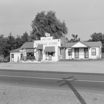 Cottage Court/Will-O-Inn roadside cabins and service station, view from across the street.