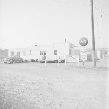 A donut and sandwich shop, photo taken further away.