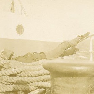Unidentified soldier reclined on a ship's ropes (1961.16.5.8)