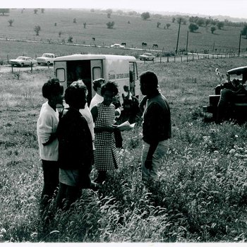 "The Learning Tree" cast and crew members take a break while on location in Bourbon and Linn counties, Kansas