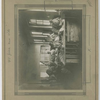 Little Blue Books Printing Press Facility- Workers assembling books