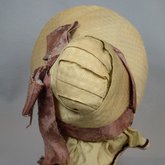 Bonnet, cream and ivory silk with deep brim and salmon ribbon, c. 1830s-1840s, back view