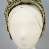 Bonnet, brown and tan raffia spoon bonnet with fabric flowers, c. 1850s-1860s, front view
