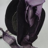 Bonnet, deep purple velvet with a peaked brim and purple silk ribbons, mid-1880s, side view