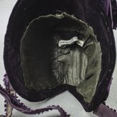 Bonnet, deep purple velvet with a peaked brim and purple silk ribbons, mid-1880s, interior view