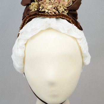 Bonnet, straw with brown velvet, brown grosgrain ribbons, and velvet chrysanthemums, 1880s, front view