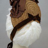 Bonnet, straw with brown velvet, brown grosgrain ribbons, and velvet chrysanthemums, 1880s, back view