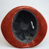 Cloche, rust velvet with embossed flowers, 1920s, interior view with label