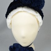 Bonnet, blue straw capote with velvet trim and feather puffs, 1870s-1880s, front view