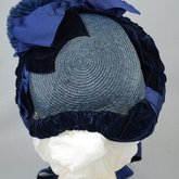 Bonnet, blue straw capote with velvet trim and feather puffs, 1870s-1880s, back view