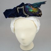 Toque, blue velvet with rhinestones and feathers, 1890s, front view