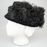 Toque, black velvet with ostrich feathers, c. 1910-1920, left side view