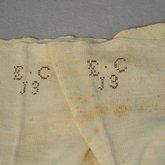 Stockings, 1820-1830, detail of embroidered initials