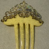 Comb, yellow with brass, late 19th century, front view