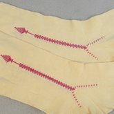 Stockings, cream cotton with red embroidered clocks, 1840s-1850s, detail of embroidery