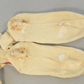 Stockings, cream cotton with red embroidered clocks, 1840s-1850s, detail of darning