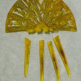 Comb, yellow with rhinestones, late 19th century, front view