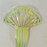 Comb, pale green with rhinestones, early 20th century