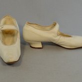 Shoes, white kidskin with strap, 1934, side and front view
