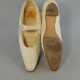 Shoes, white kidskin with strap, 1934, top and sole view