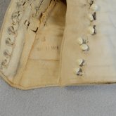Boots, white canvas high-buttoned, 1915, detail of buttonhole lining