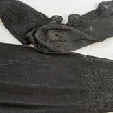 Stockings, black silk with openwork, 1880-1900, detail of back seam and heel darning
