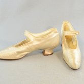 Shoes, white satin with strap, 1920s, side and front view
