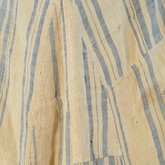 Dress, blue and white striped linen, homespun, c. 1800, detail of exterior right side gore with piecing and mends