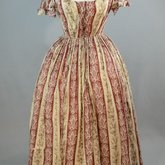 Dress, red and cream striped printed cotton, c. 1850s, front view
