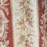 Dress, red and cream striped printed cotton, c. 1850s, detail of skirt seam