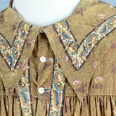 Housedress, brown printed cotton, c. 1835-1850, detail of collar piecing and trim