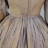 Dress, printed cotton with lavender and black, 1860s, detail of center back gathers
