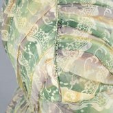 Dress, fan-front with printed green and lavender barege, 1840s, detail of pleats and piping at shoulder