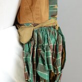 Dress, green silk plaid, 1850s, detail of secret pocket and top of turned-under skirt pleat fabric