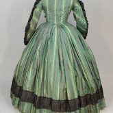 Dress, green taffeta plaid silk with black silk pleated trim, 1853-1863, back view