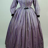 Dress, purple silk with silver, black, and pink stripes, c. 1865, front view