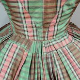 Dress, green, pink, and brown silk plaid, c. 1865, detail of skirt piecing