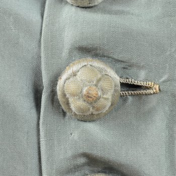 Dress, sage silk taffeta with belt, c. 1870, detail of buttons
