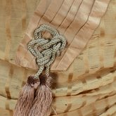 Dress, amber silk taffeta with chenille-fringed barege overdress, c. 1880, detail of cord and tassels