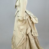 Dress, light gray silk faille with steel blue trim, 1870s, side view
