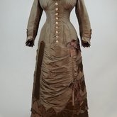 Dress, asymmetrical natural form brown silk taffeta and satin, c. 1880, front view