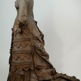 Dress, asymmetrical natural form brown silk taffeta and satin, c. 1880, left side view