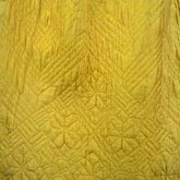 Quilted petticoat, yellow silk, 18th century, detail of quilting