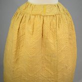 Quilted petticoat, yellow silk, 18th century, detail of wool lining