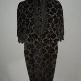 Mantelet with lappet tails in black voided velvet, 1880s, front view